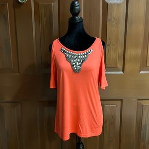 Women’s small, orange, cold shoulder T-shirt.